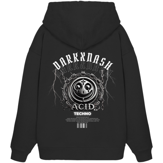 Rückseite eines schwarzen Hoodies mit DARKXNASH-Logo, Acid-Techno-Design, metallischem Smiley, Stacheldraht und Barcode-Elementen. Perfekt für Techno-Fans